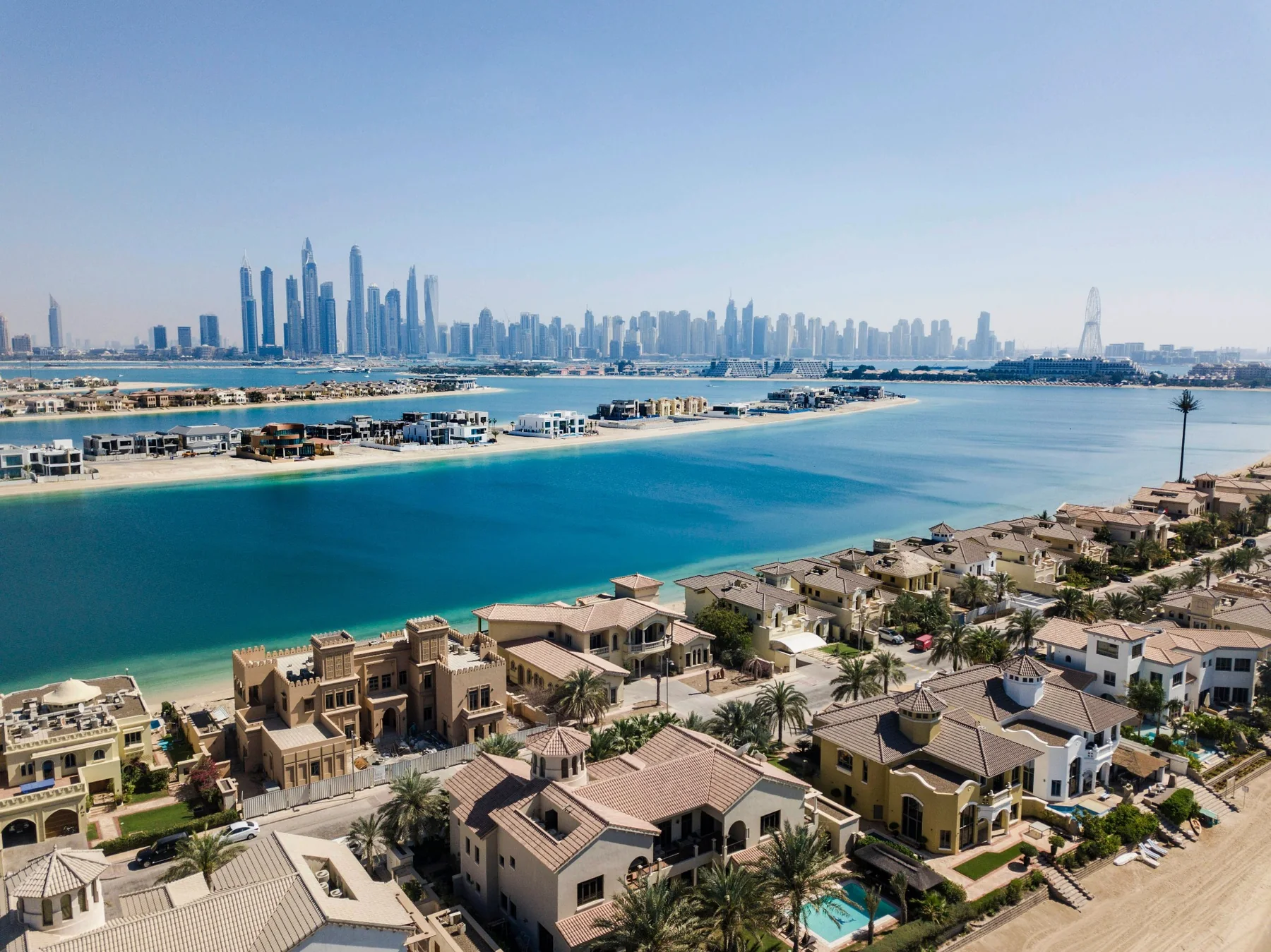 Palm Jumeirah villas with Dubai Marina skyline
